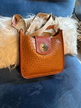 Dooney & Bourke Rust/Tan Ostrich-Texture Crossbody with Gold Tone Turn-Lock